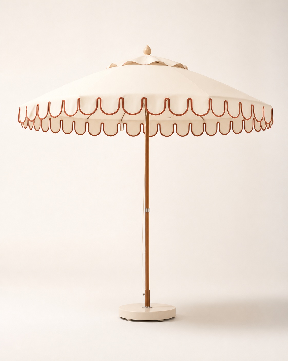 Ivory parasol with coral scalloped piping