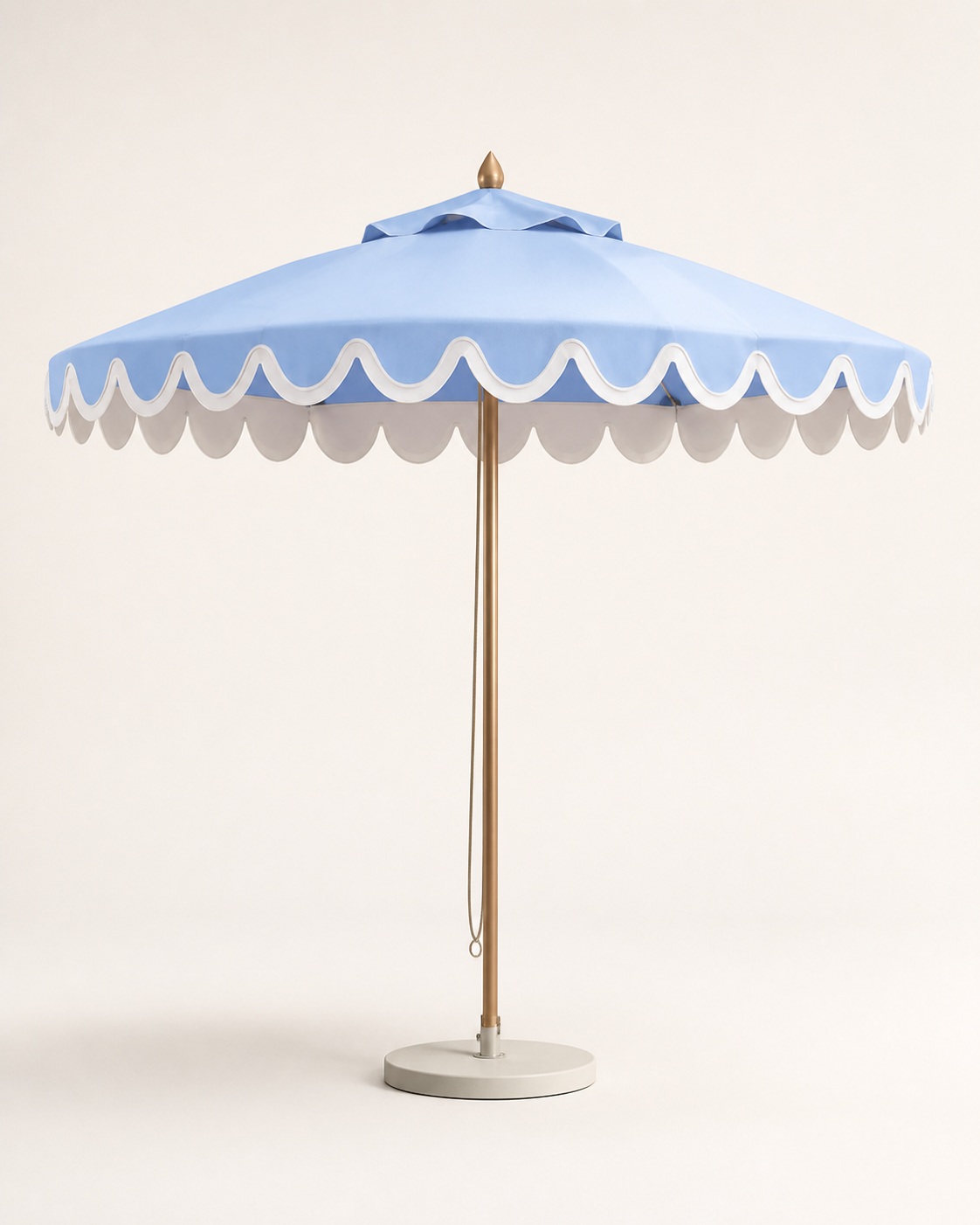Powder-blue parasol with white scalloped trim
